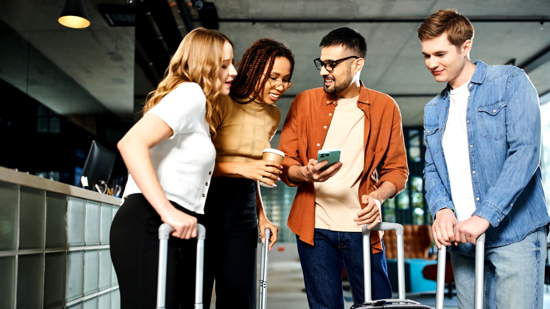 Four friends getting group flight discounts at the airport.