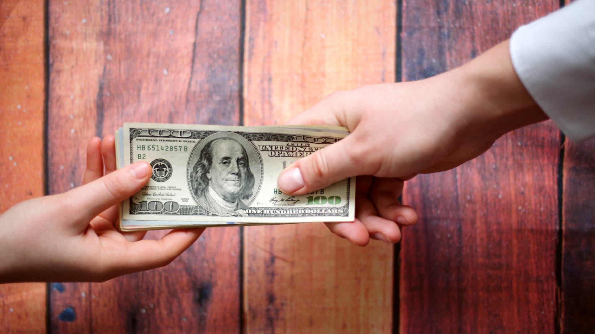 Paying money upfront for a trip.