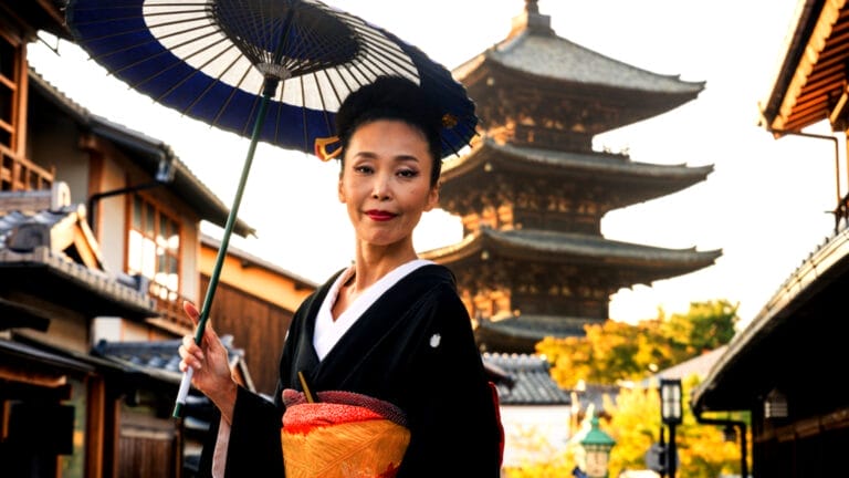 Asian woman with things to do in Kyoto Japan.